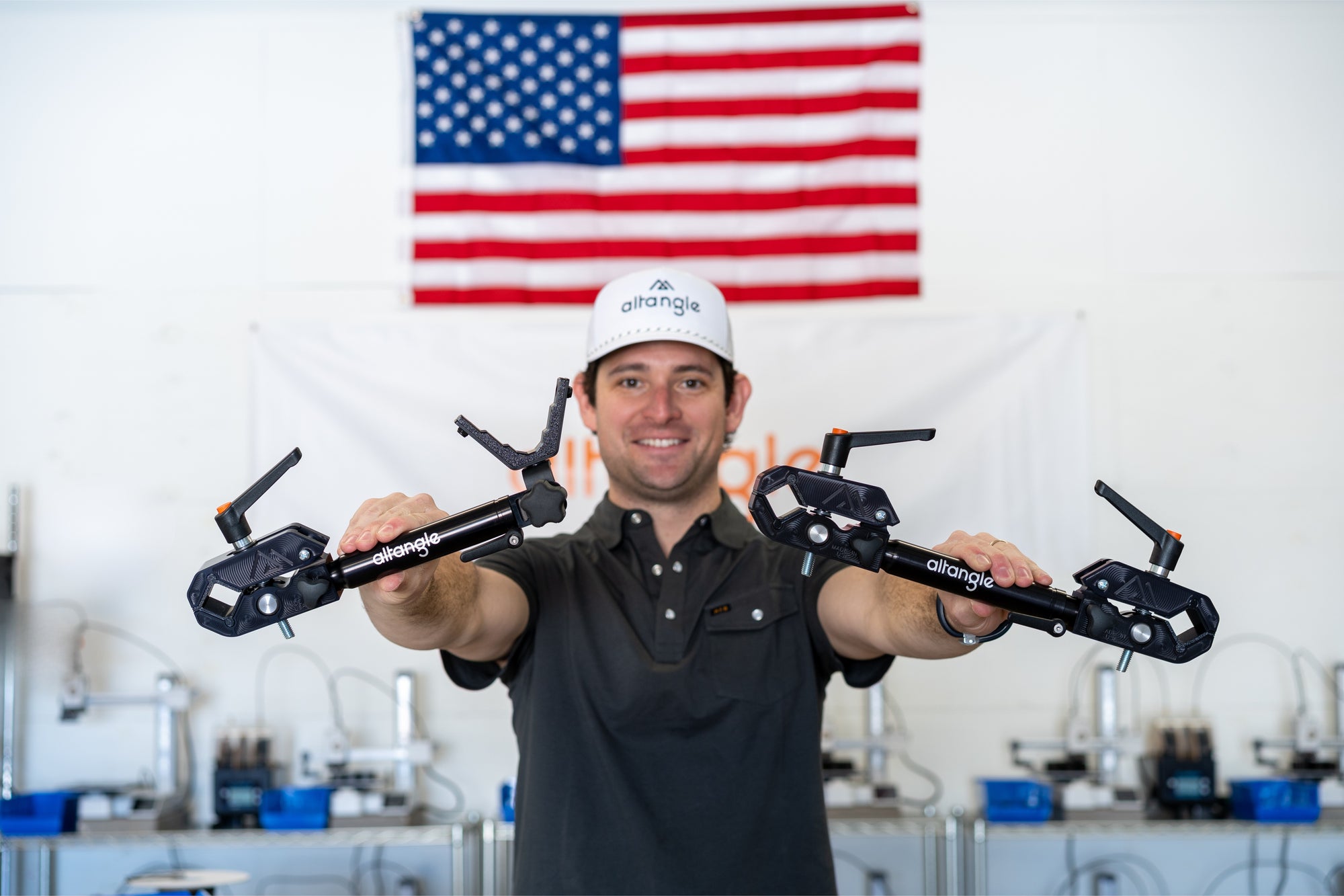 CEO holding two Connect Aims